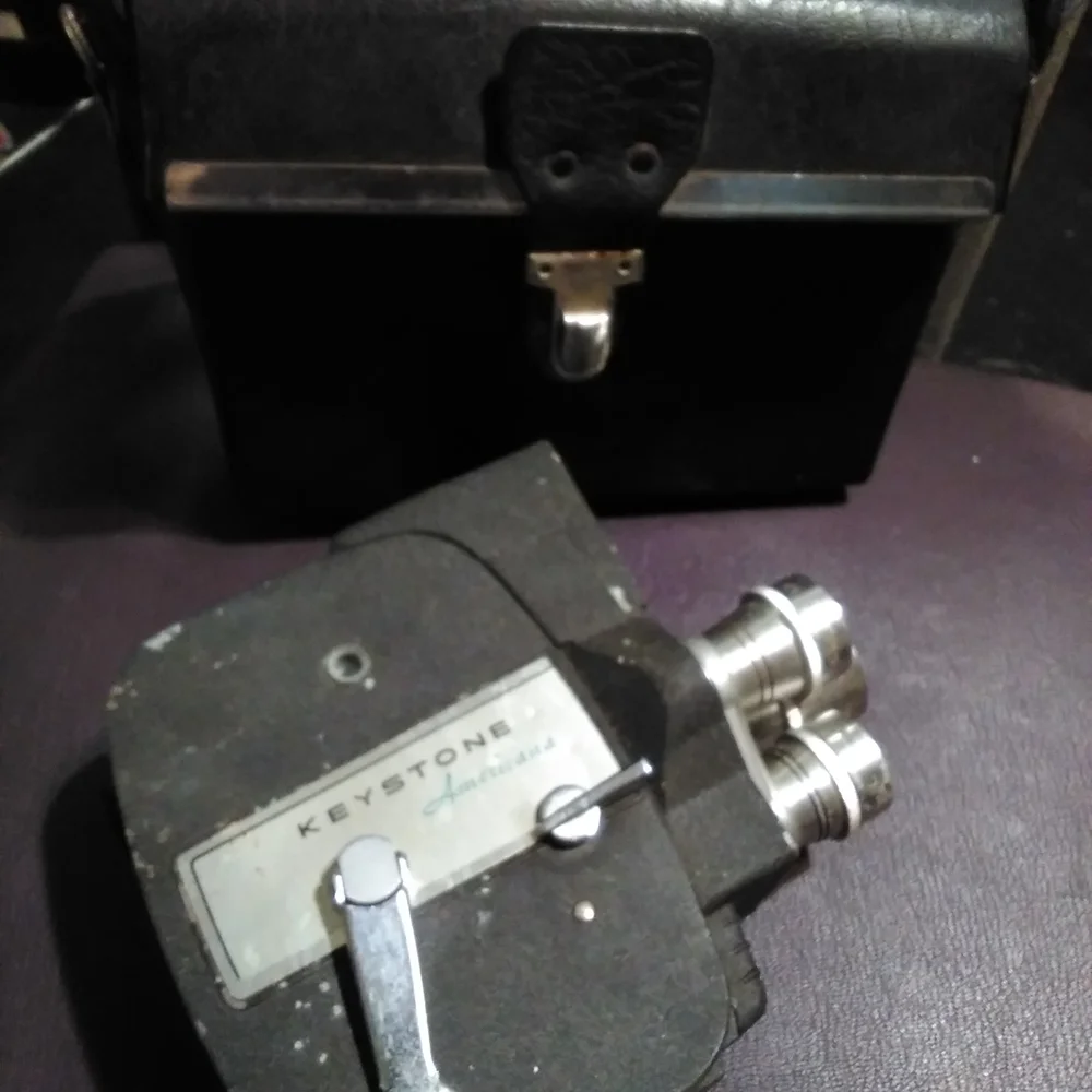 Vintage Camera with Triple Lens System - Black and Silver